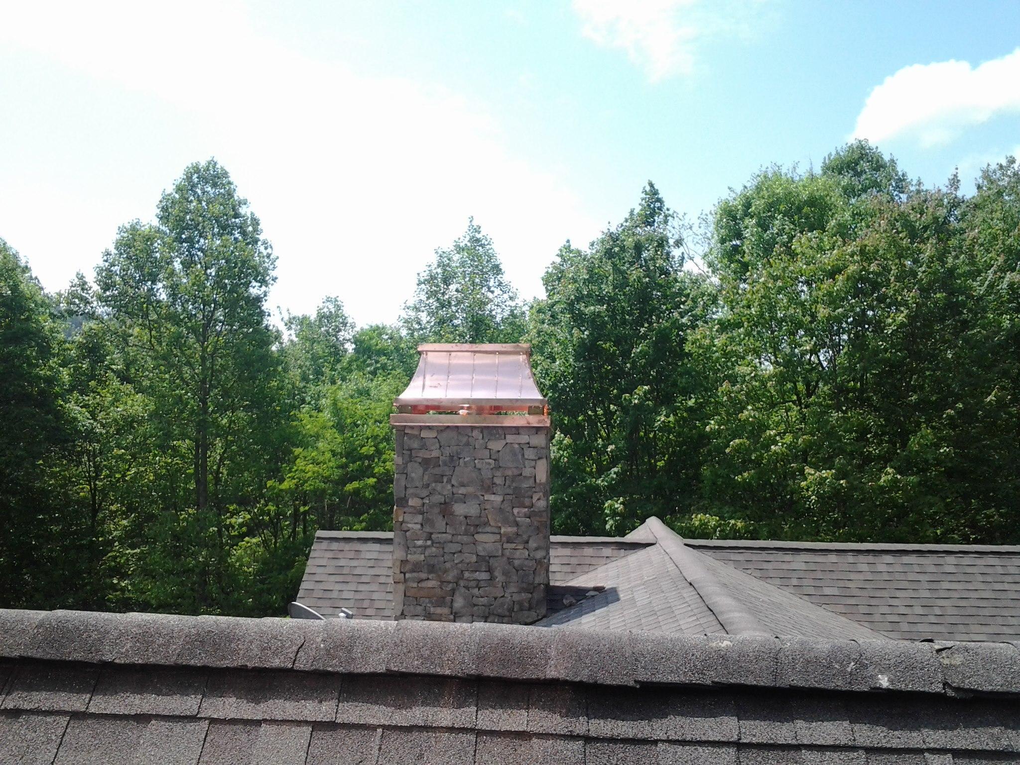 Decorative chimney shroud fabricated in copper